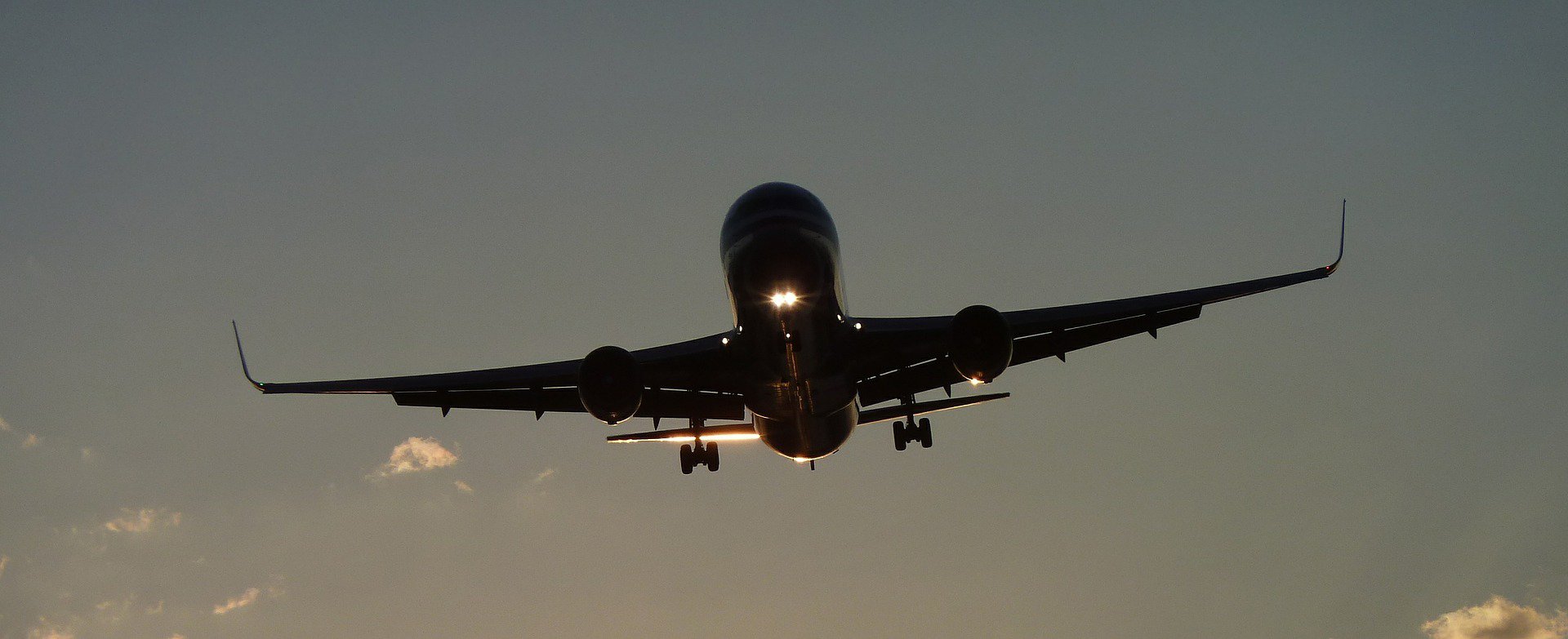 Aircraft in flight at dusk