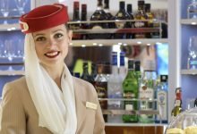 Emirates_flight_attendant_in_the_Airbus_A380_bar-1024x471